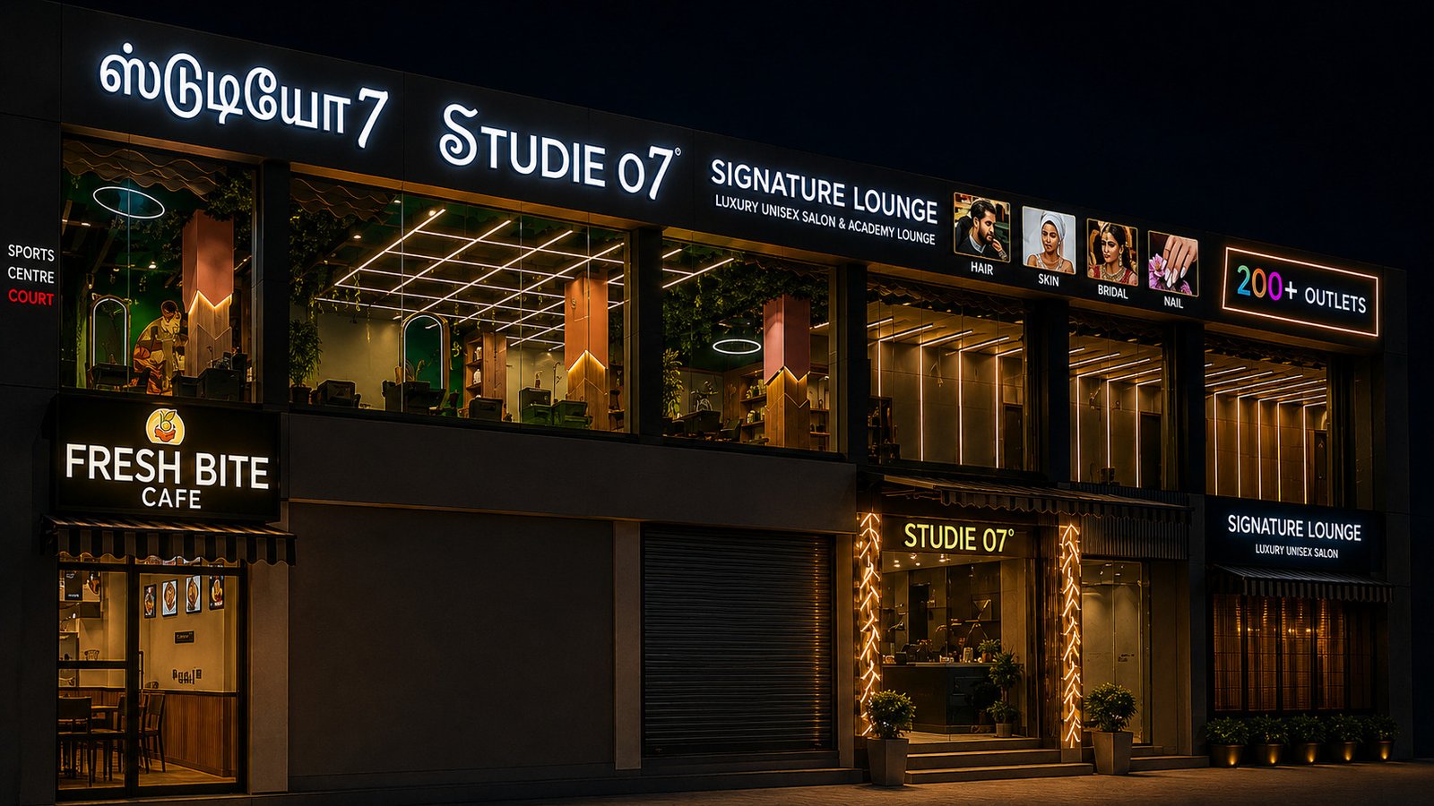 Studie'o7 Signature Lounge full frontage lit up at night with the Fresh Bite Cafe and 07 Outlets signage